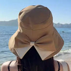 Women's sun hat with bow and wide brim – foldable, 360° protection
